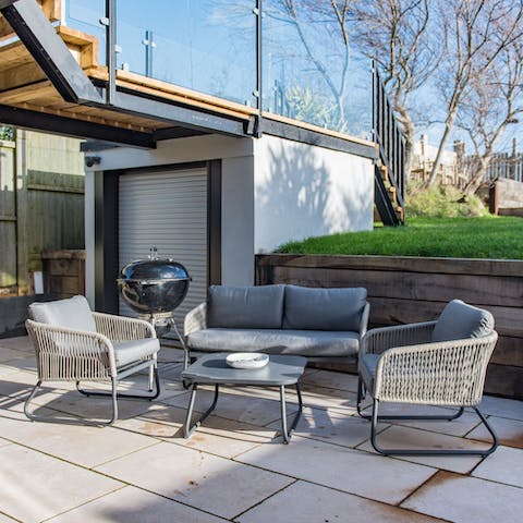 Enjoy home cooked pizzas straight from the pizza oven, on the large terrace