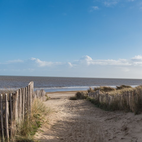 Escape to the quiet part of Greatstone beach, directly through the garden