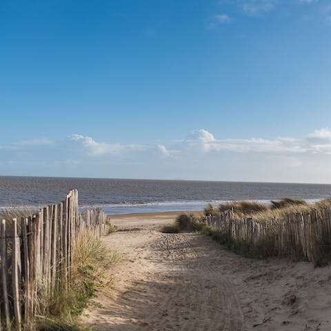 Escape to the quiet part of Greatstone beach, directly through the garden