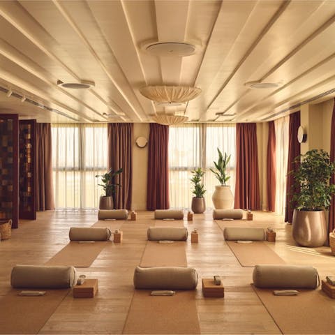 Stretch out your muscles in the on-site yoga room
