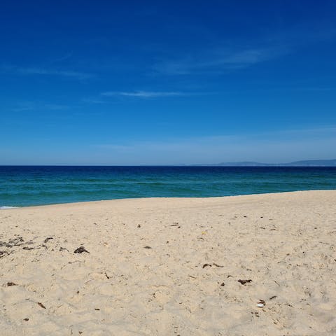 Visit the sandy Carvalhal Beach, just a short drive from the holiday home