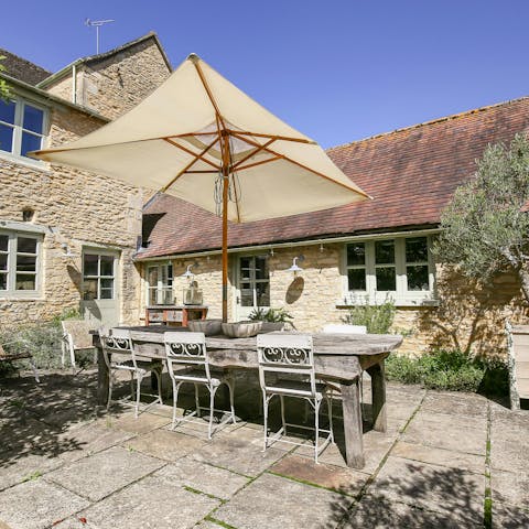 Dine alfresco on the charming terrace