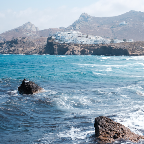 Swim in the surf at Plaka Beach – it's a nineteen-minute walk