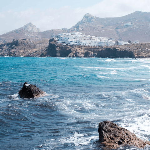 Swim in the surf at Plaka Beach – it's a nineteen-minute walk
