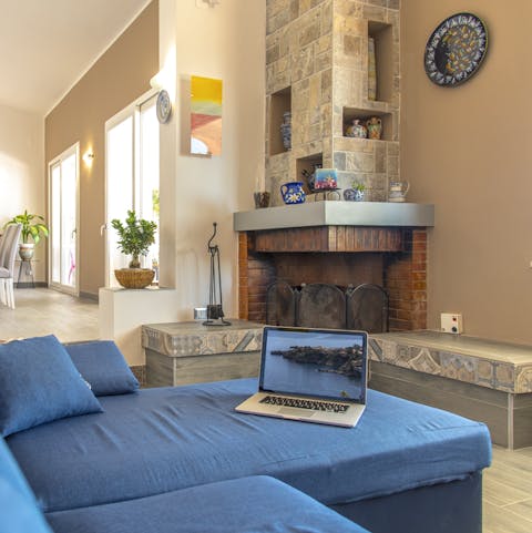 Admire the traditional touches inside like the old brick fireplace