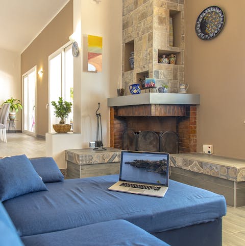 Admire the traditional touches inside like the old brick fireplace
