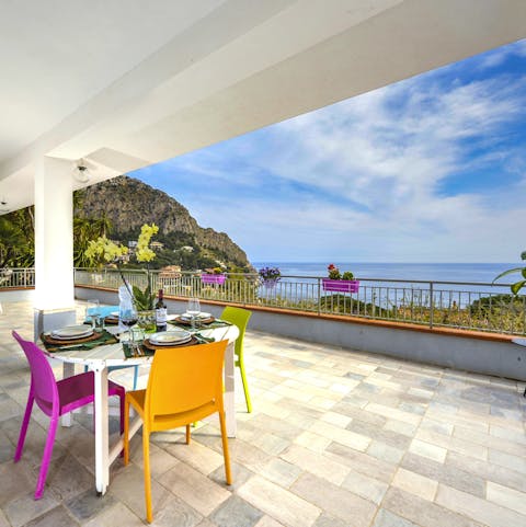 Set up for long lunches on the vast terrace upstairs with a view to the sea