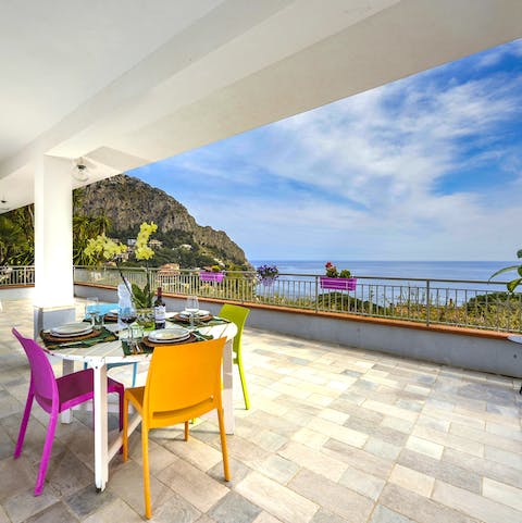 Set up for long lunches on the vast terrace upstairs with a view to the sea