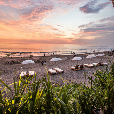 Watch the waves roll in on Berawa Beach, around a ten-minute walk away