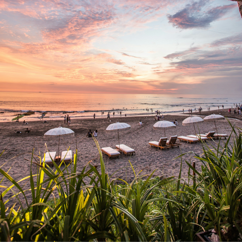 Watch the waves roll in on Berawa Beach, around a ten-minute walk away