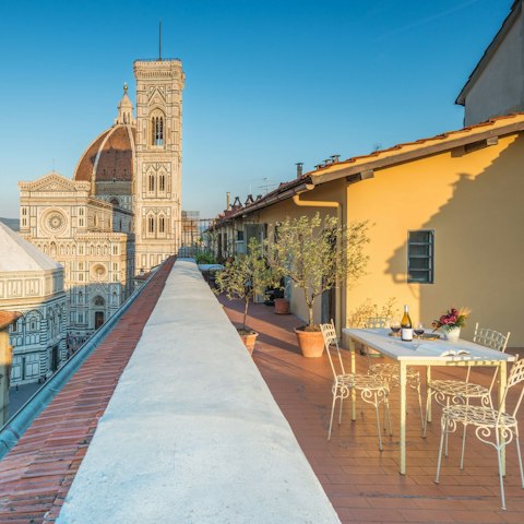 Admire views of the city as you dine alfresco on the shared roof terrace