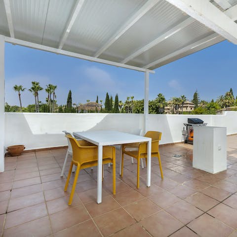 Gather together for an alfresco barbecue feast on the large private terrace