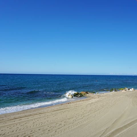 Sink your toes in the sand at Casablanca Beach, a short stroll away