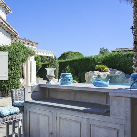 Prepare a feast by the outdoor summer kitchen