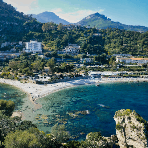 Explore the historic centre of Taormina, a twenty-two-minute walk from home