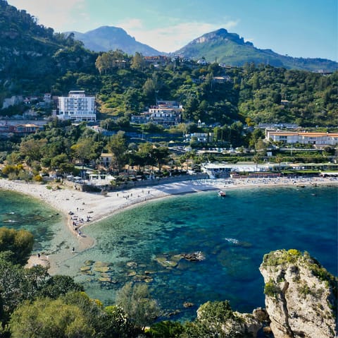 Explore the historic centre of Taormina, a twenty-two-minute walk from home