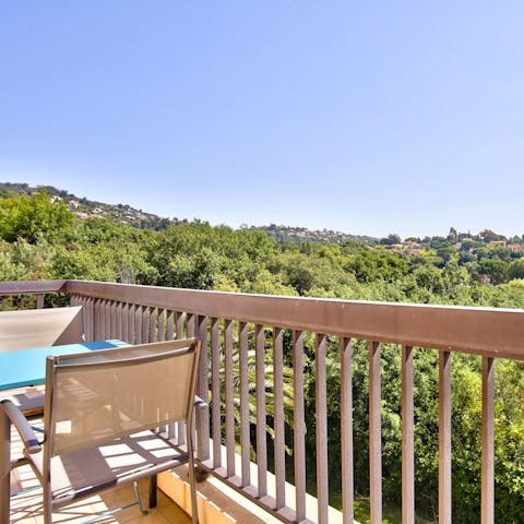 Soak up stunning views from the private balcony