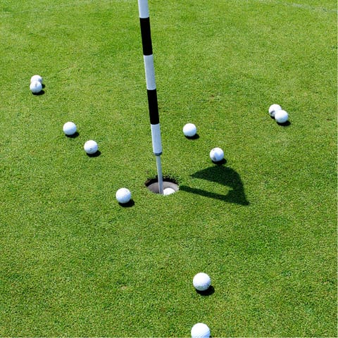 Play a round or three of golf on the estate's two courses