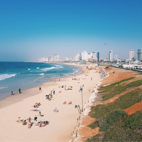 Stroll minutes away to spend the day at Aviv Beach