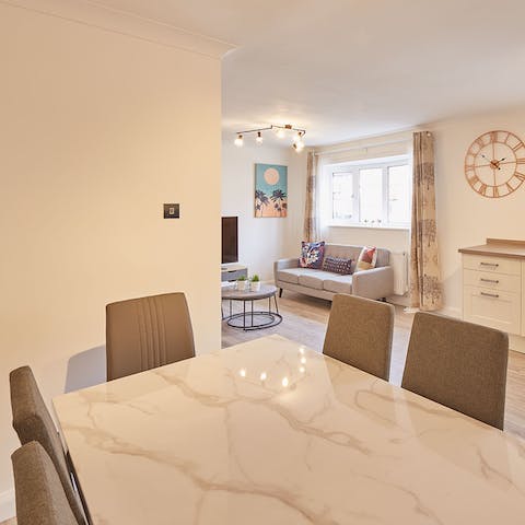 Tuck into tasty English cuisine around your stunning marble dining table