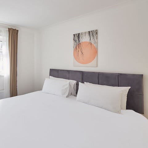 Get a great night's sleep in your comfy bed, complete with calming art