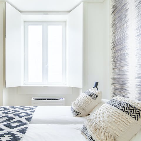 Sleep soundly in the master bedroom – inspired by the black and white mosaic pavements found throughout the city