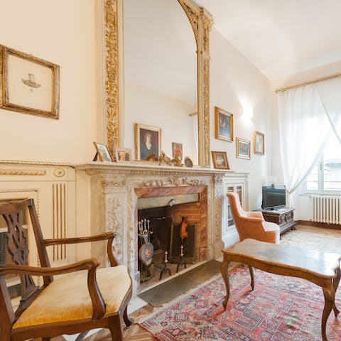 Enjoy the quiet elegance of the sitting room with a refreshing drink in hand