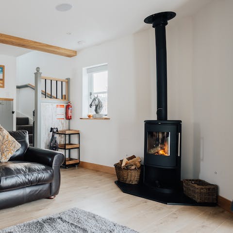 Throw another log on the wood-burning stove in the living room