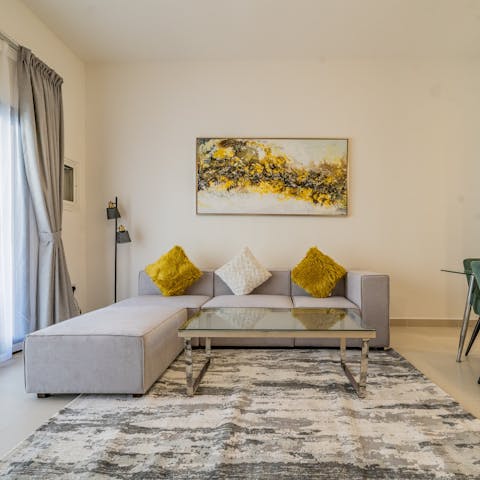 Relax and unwind in the stylish living area after a day of sightseeing