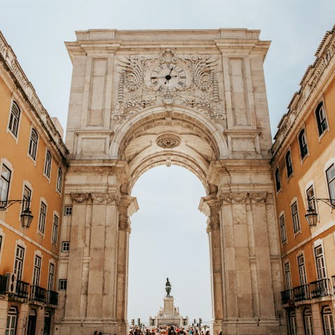 Stroll along the riverfront to the elegant Praça do Comércio – a kilometre away