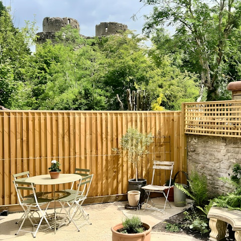 Unwind in the private garden with views of Nunney Castle