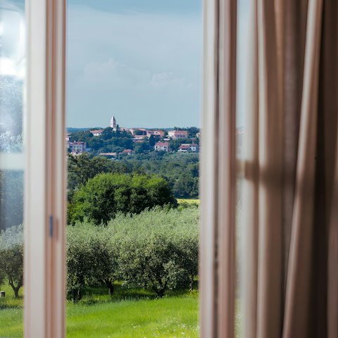 Admire the far-reaching views from the Juliet balcony