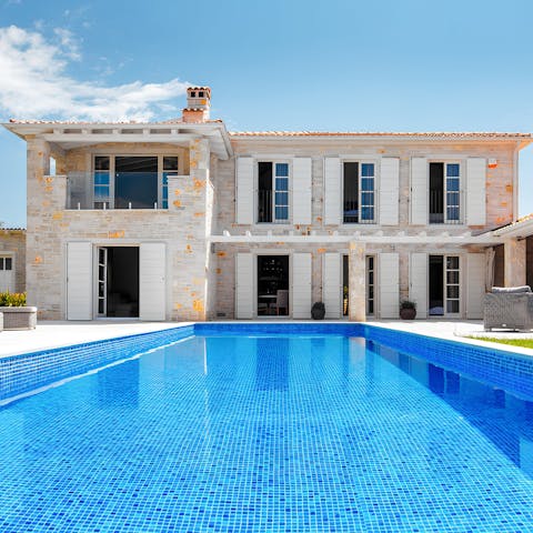 Float the day away in the private pool