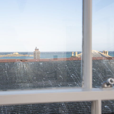 Take in sea views across the rooftops from the top floor