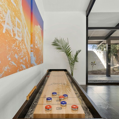 Play shuffleboard in the chic living space