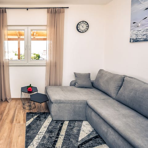 Curl up on the L-shaped couch with your morning coffee