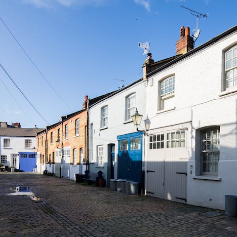 Revel in the tranquility of your sought-after mews location