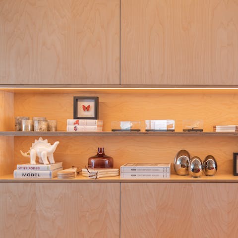 Admire the curated collection of trinkets and books