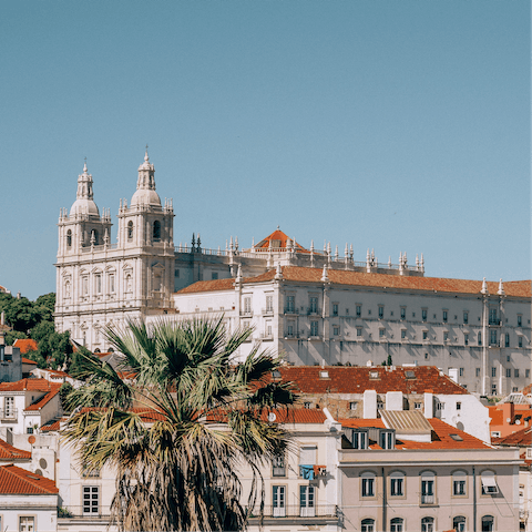 Walk twenty minutes (or catch the nearby metro) to the historic Alfama neighbourhood