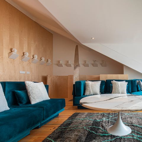 Relax in the artsy living room after a day exploring the city