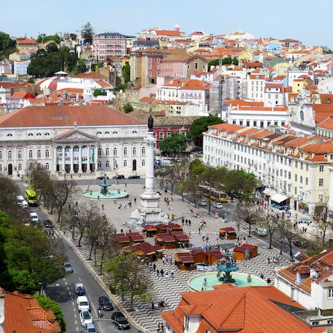 Take a casual twenty-nine minute walk to the architectural majesty of Rossio Square