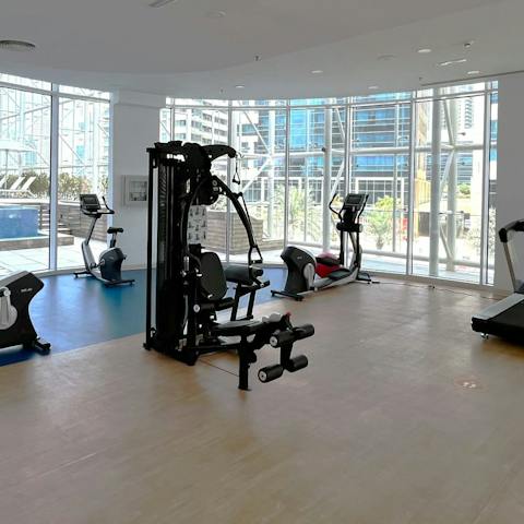 Stay on top of your fitness goals with a workout at the communal gym