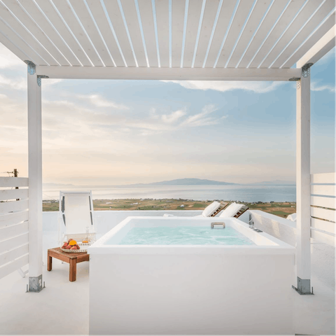 Spend leisurely afternoons relaxing in your private outdoor Jacuzzi