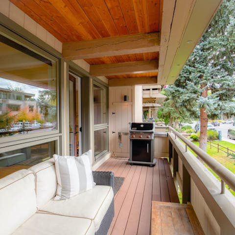 Enjoy an evening drink on the balcony as you fire up the grill