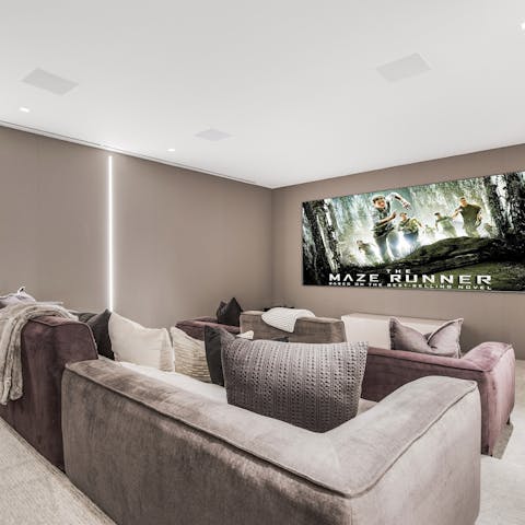 Gather for family movie nights in the private cinema room
