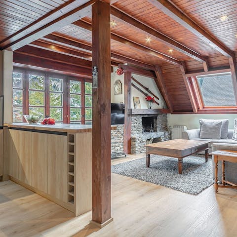 Admire the mountain view from the sunny living room