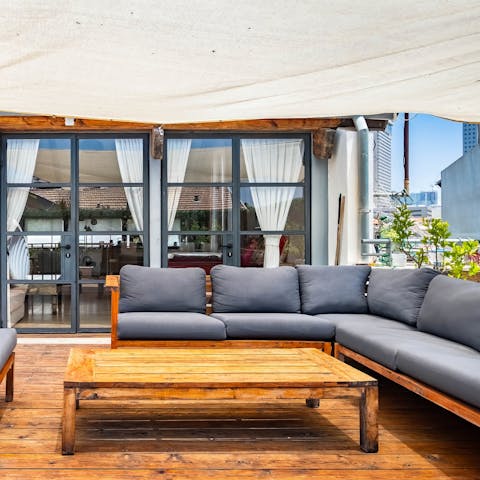 Catch the last of the evening sun from your private rooftop terrace