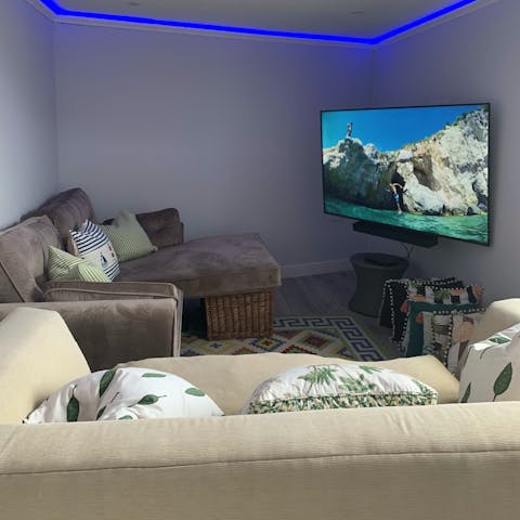 Enjoy a movie night with loved ones in the cinema room