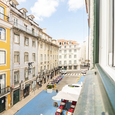 Admire Baixa views from the living room's windows