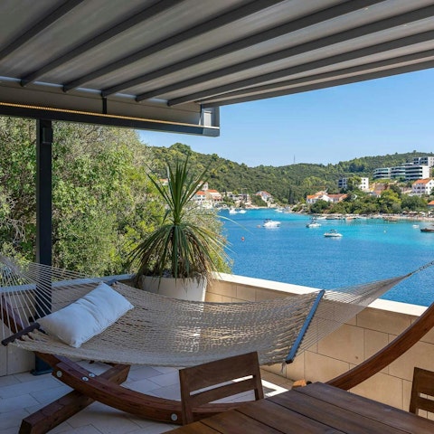 Lie back on the hammock and admire the sea views